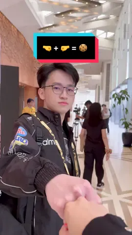 A post by @mlbbesports_official on TikTok caption: 🤜 + 🤛 = 🍪  #MLBBEsports #MLBB #EWCxMSC #EWCxMSC2025 #MobileLegendsBangBang #MSC2025 #MSCatEWC25
