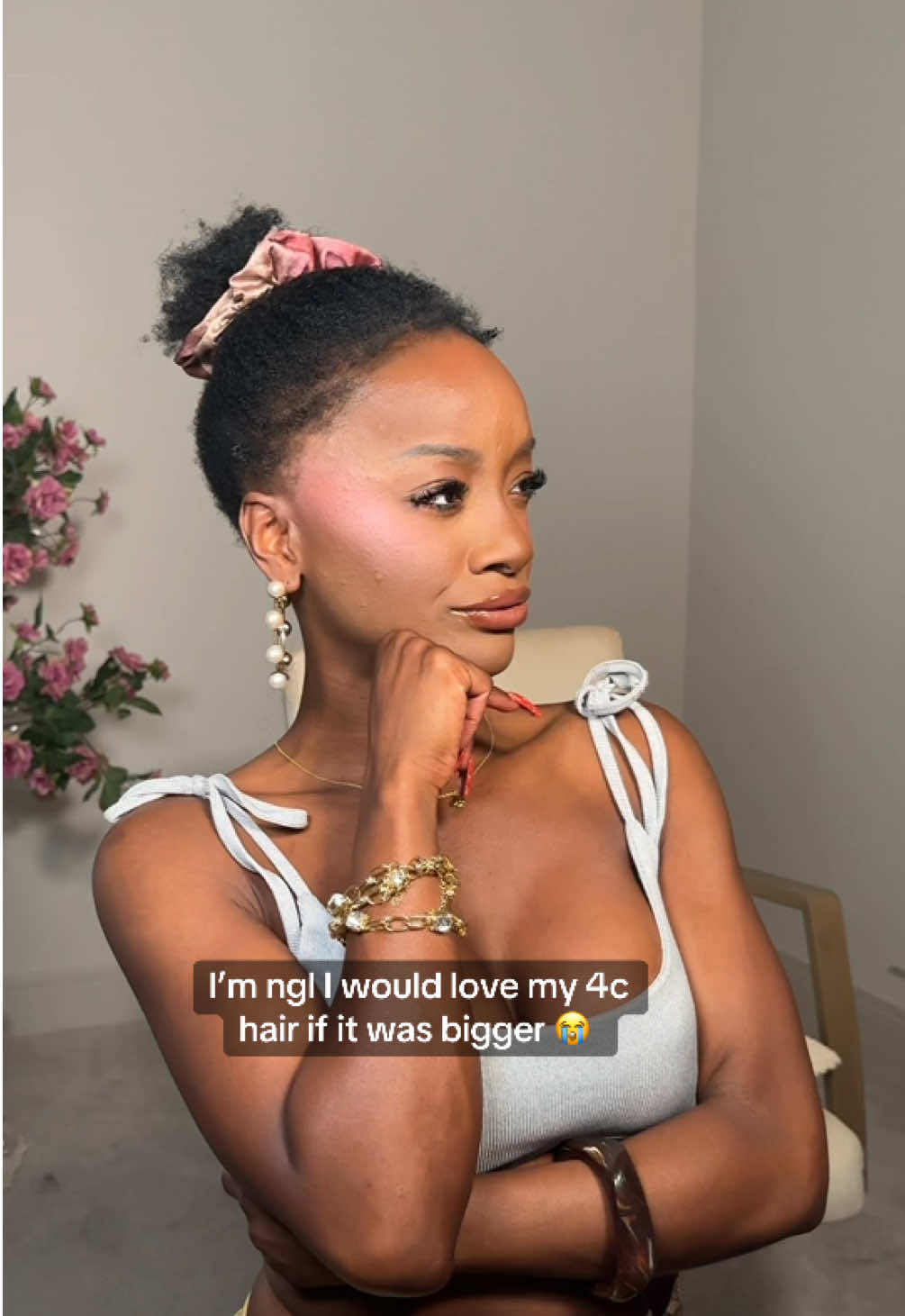A post by @amandaupnext on TikTok caption: Okay so I need 20” kinky coil hair growing from my scalp THEN I’d listen to them comments  “u should wear it out more” 😂 @OQHAIR #naturalhair #thickhair #updohairstyle #penteado #halfwig 