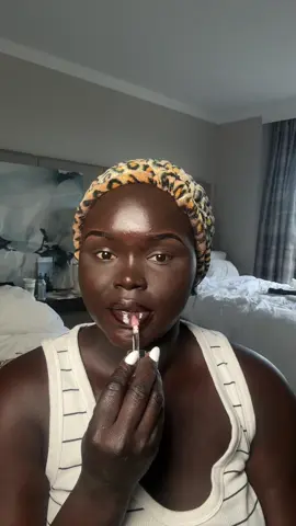 A post by @dollievision on TikTok caption: short makeup video 🤎 #fyp #makeup #nyadollie #beautytok 