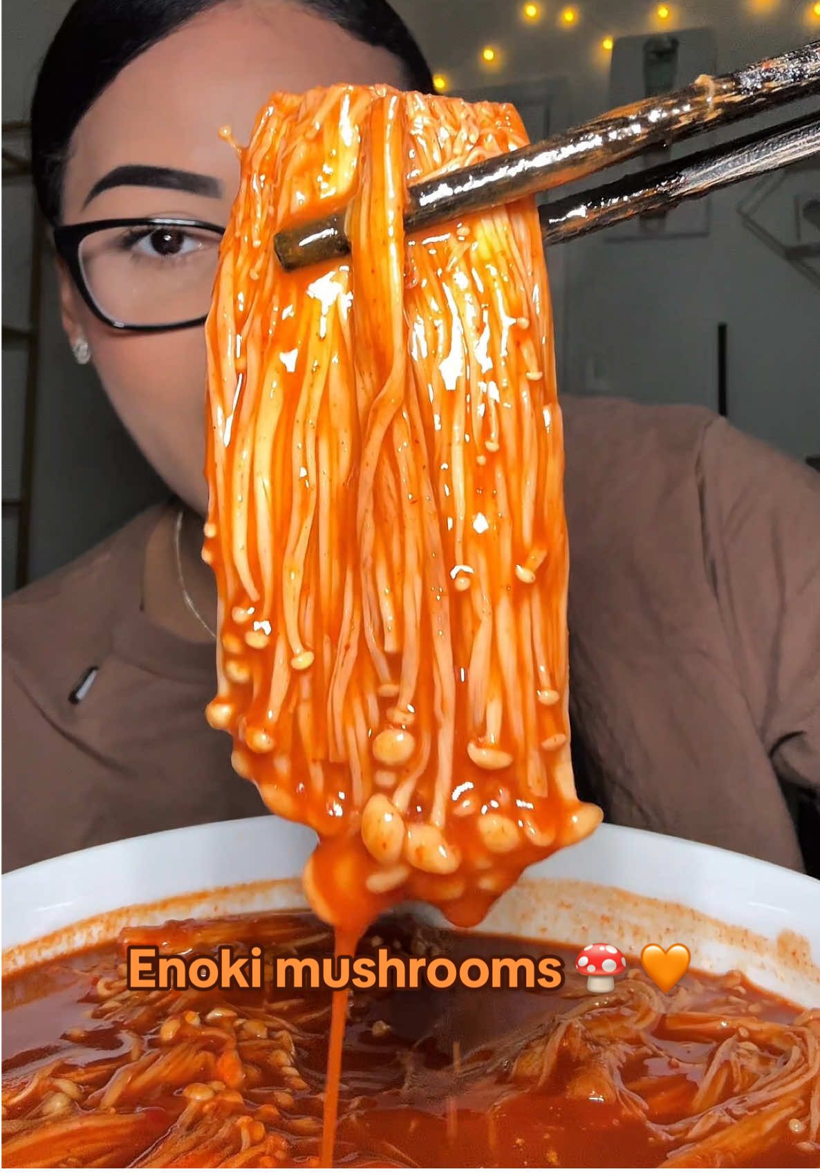 A post by @aliviadonai on TikTok caption: y’all why have I been making Buldak after midnight the last few nights😭😭 I gotta break that habit asap! But drop y’all’s best pic of Buldak in the comments! Iove yall so much!!❤️❤️ #enoki #enokimushroom #fyp #viralvideo #viraltiktok 