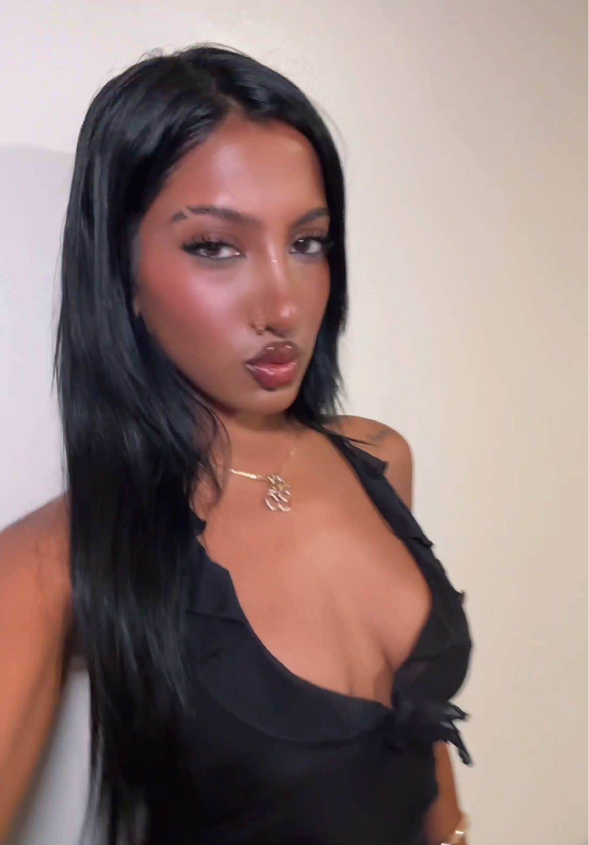 A post by @katseyeworld on TikTok caption: here to confirm Gabriela does wear it on a chain around her neck #KATSEYE #KATSEYE_Lara 