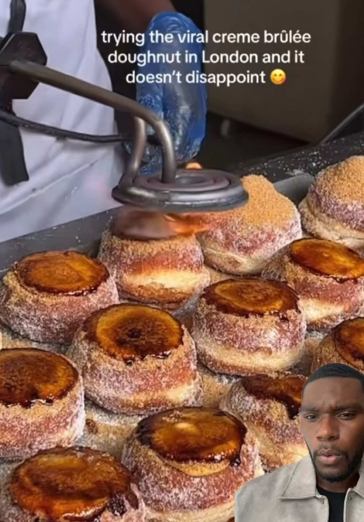 A post by @tyshonlawrence on TikTok caption: I’ve been seeing these crème brûlée donuts at borough market so you know I had to pull up