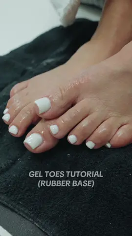 A post by @prettyndivinebeauty on TikTok caption: white toes for the whaaaat?🤍🤌🏼 #nailtok #nails #rubberbase #nailsoftiktok #howtonails #nailprocess #toebbl #geltoes #watchmework 