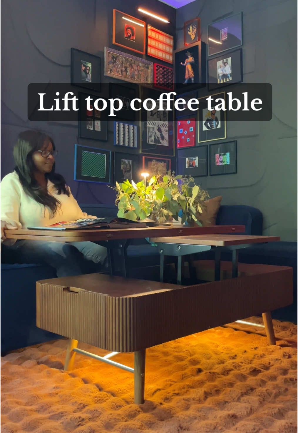 A post by @myuglyapartment on TikTok caption: Shop this post in my bio under “shop the man cave”  #lifttopcoffeetable #indoorbasketballhoop  #masculinedesign #sportsdecor #darkandmoodydecor #cozyapartment #mancaveideas #mancaveideas #apartmentdecor #apartmentinspo #atlantainteriordesigner 