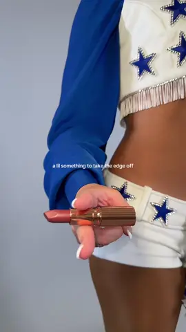 A post by @dccheerleaders on TikTok caption: need that! 💄 #DCCheerleaders #AmericasSweethearts #DCC #cameo #makeup 
