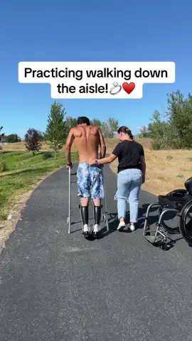 A post by @amberandneven on TikTok caption: Practicing walking down the aisle!♥️ #paralyzed #paraplegic #wheelchair #wheelchairlife #fylpシviralシ #spinalcordinjury #spinalcordinjuryrecovery #spinalcordinjurysurvivor #fiance #engaged #motivation #howto #dirtbike #moto #racing #foryoupage #craighospital @Amber Cogbill @Neven 