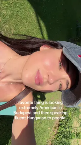 A post by @emmalanyi on TikTok caption: Everyone’s faces always kill me whenever I start speaking Hungarian😭😭 #fyp #budapest #hungarian 