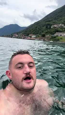 A post by @mashtag_brady on TikTok caption: Swimming In Lake Como #mashtagbrady #mashtaglazy #mashtagtravels 