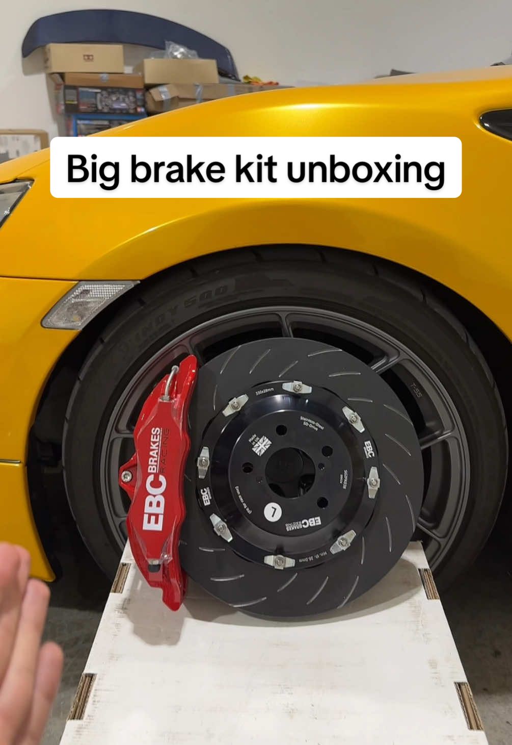 A post by @nikolaiiaksenov on TikTok caption: These brakes are massive 😂 #bigbrakekit #carupgrade #carsoftiktok @EBC Brakes 