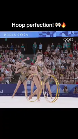 A post by @olympics on TikTok caption: A flawless performance from the People’s Republic of China team, who won their first-ever Olympic gold medal in group rhythmic gymnastics at #Paris2024. 🇨🇳🥇 #Olympics #Sports #Gymnastics 