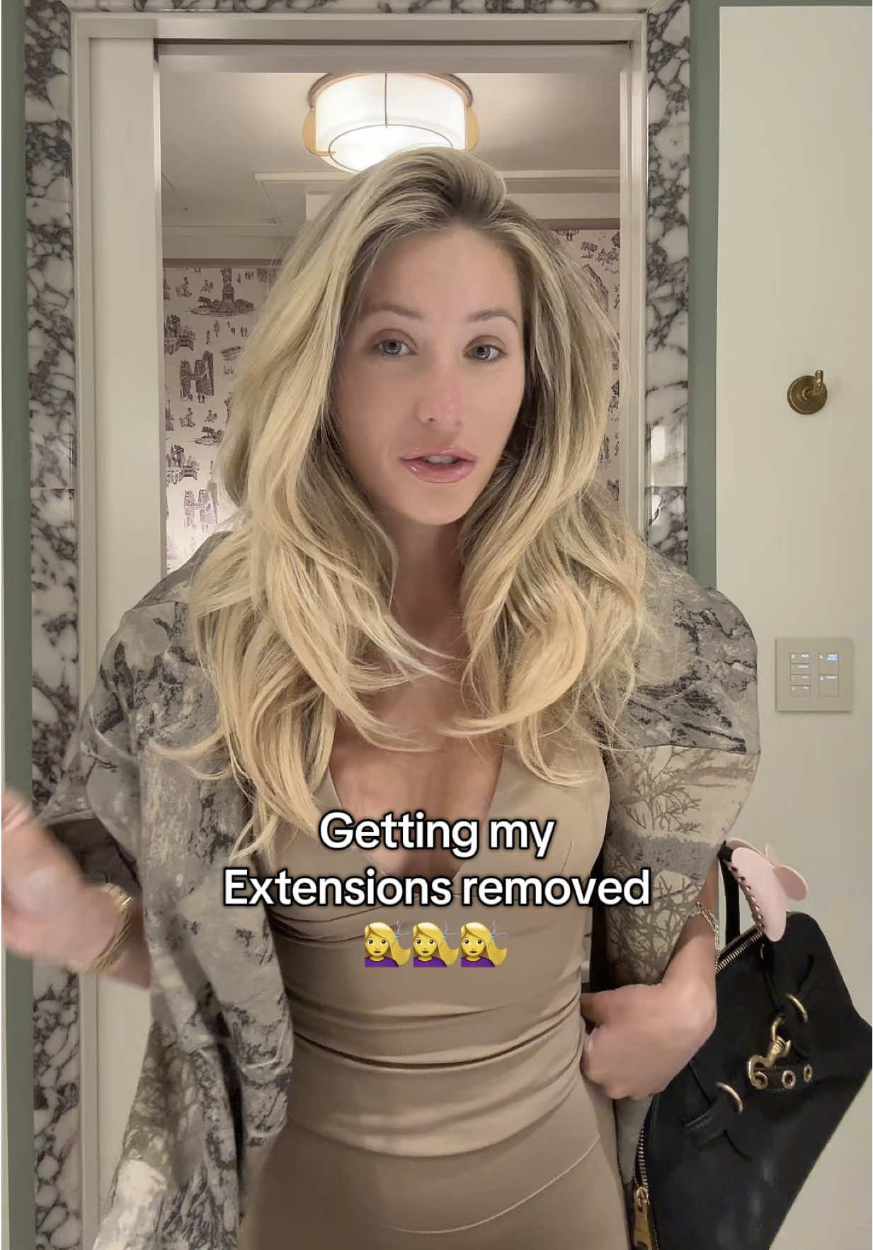 A post by @alixearle on TikTok caption: IM SHOCKED 👁️👁️ my hair is actually growing Priscilla is extension queen 