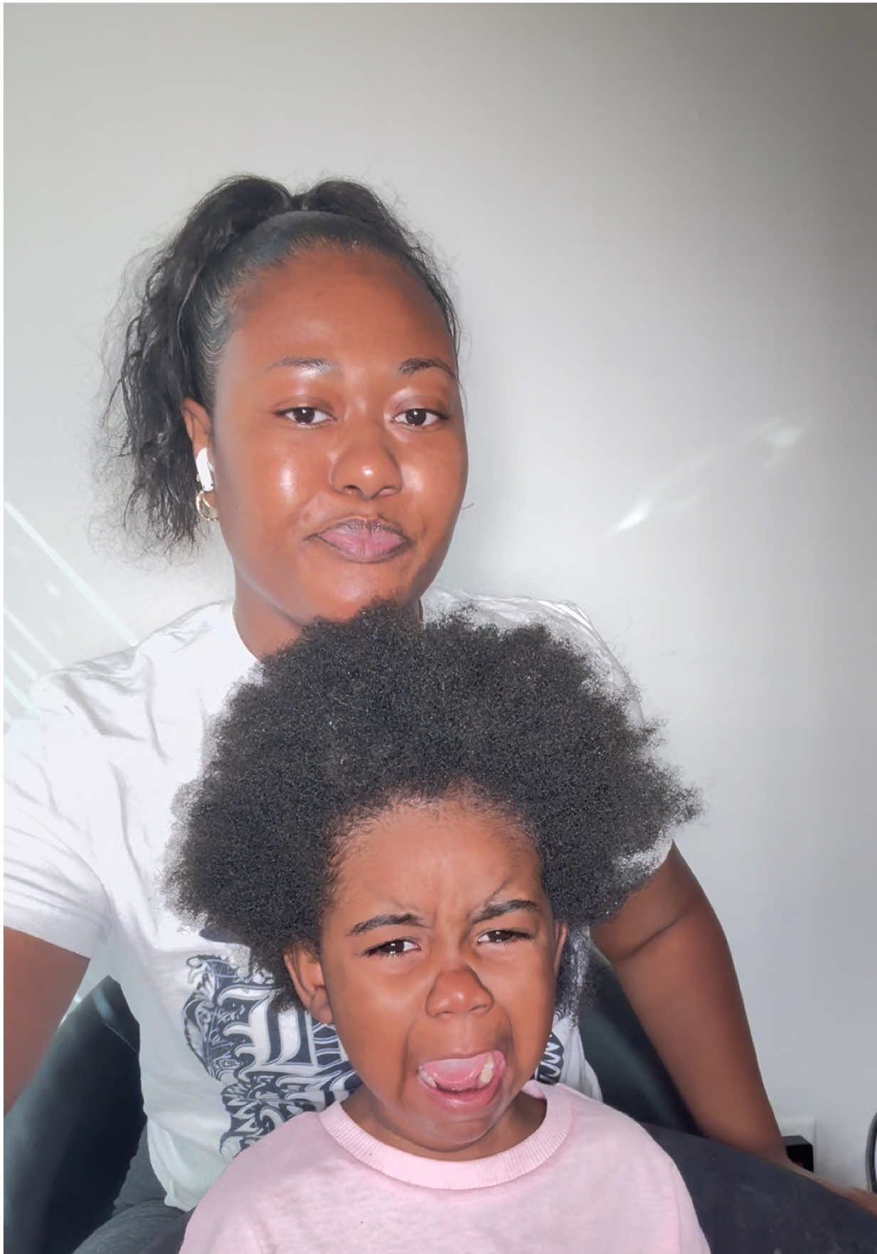 A post by @lavishmelovely on TikTok caption: One thing about dream is, she is going to cry! Baby girl don’t play no games during getting her hair done, but once it’s finished, she’s as happy as can be. #shaniquatierra #lavishmelovely #fypシ #fypシ゚viral🖤video #fypシ゚ #fypシ゚viral #kidstylist #kidbraider #ponytail @ShaniquaTierra  