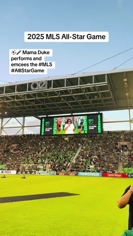 A post by @mamaduketv on TikTok caption: ⚽️🎉 What an honor to be chosen by the @Major League Soccer and recommended by @AustinFC to perform and emcee the 2025 #MLS #AllstarGame at #Q2Stadium 🏁 What a thrill! To have my #YMCA kiddos in the pit on the field watching me was the best part of it all. 