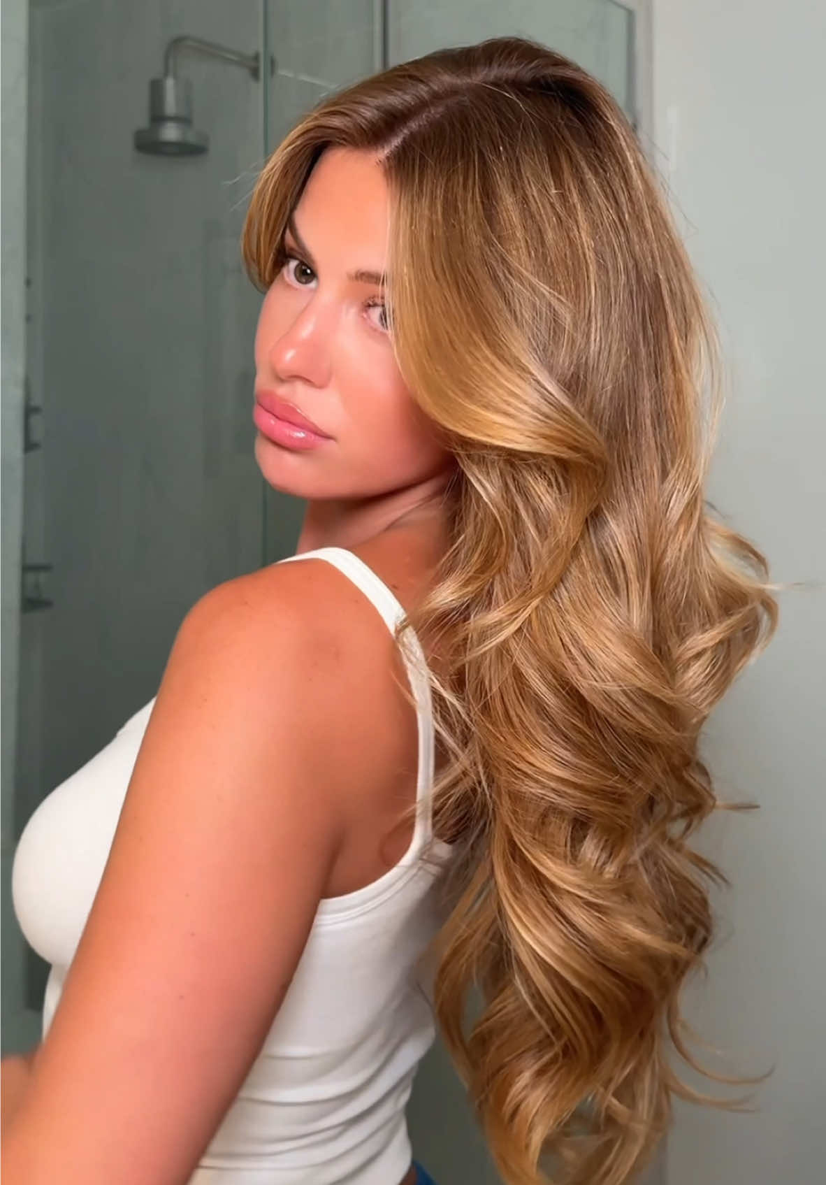 A post by @anggwells on TikTok caption: Haircare 101: never skip a leave-in. For my girls whose hair needs a bit more TLC, go for @milkshake usa’s Incredible Milk. If you’re looking for something super light, go for their original leave in conditioner. Watch until the end to learn how I mix the two for best results🥛✨#milkshake #milkshakepartner #ad