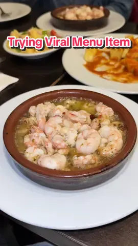 A post by @kaylee_brice on TikTok caption: being honest! #madrideats #boilinggarlicshrimp #lacasadeabuelomadrid 