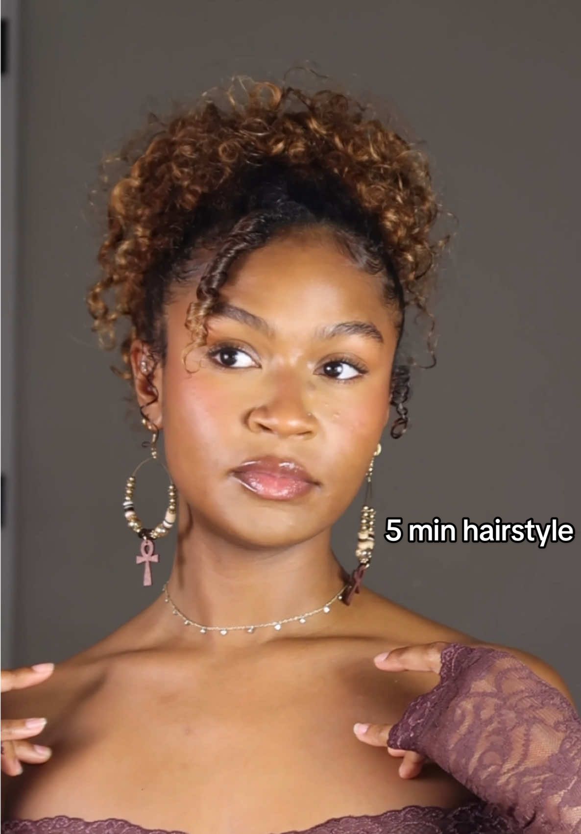 A post by @mailayazuri on TikTok caption: ~ the mom-do ~ (for when I don’t have time to really get into doing my hair)  products: @Redken curl mist @As I Am USA castor oil spray @Fenty Hair gel @Emi Jay angel mist 🩷 #curlyhairstyles #curlyhair 