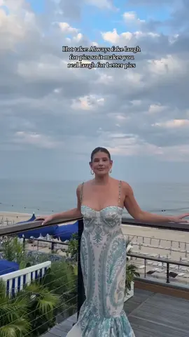 A post by @remibader on TikTok caption: My mom in the back 😂