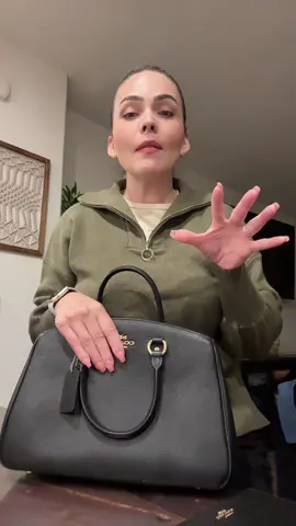 A post by @donareclamos on TikTok caption: My new coach bag 