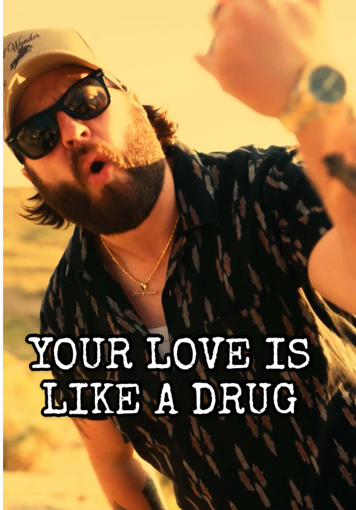 A post by @natesmithmusic on TikTok caption: Might have a problem 💉 #yourloveislikeadrug #toxic #fyp