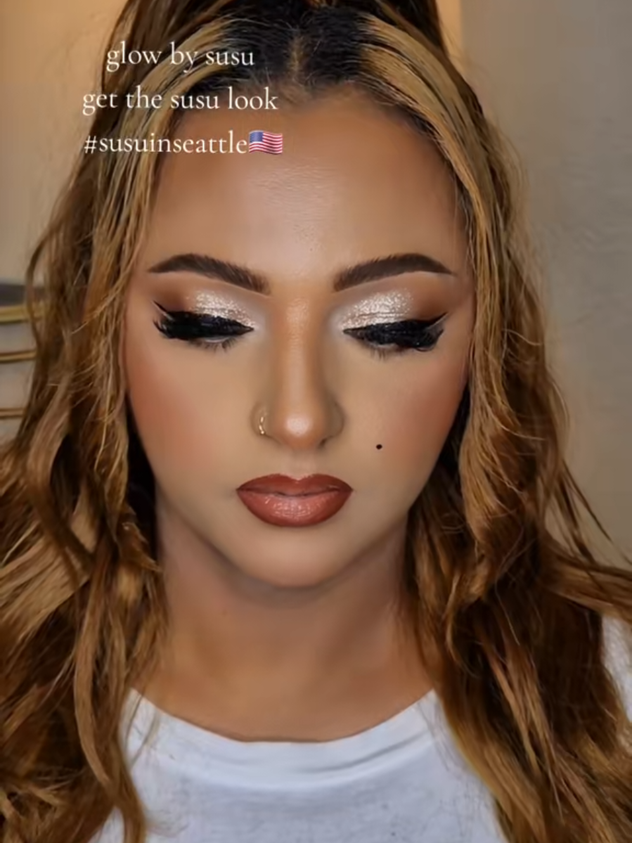 A post by @susumua2 on TikTok caption: #glowbysusu🇪🇷 #seattlemakeupartist #susuinseattle🇺🇲 #seattlemua #habeshatiktok #eritreantiktok🇪🇷🇪🇷habesha #ethiopian_tik_tok #ethioerteria🇪🇹🇪🇷🇪🇹🇪🇷🇪🇹 