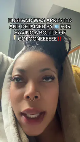 A post by @eboniqueluxe on TikTok caption: HUSBAND WAS ARRESTED AND DETAINED BY 🧊 FOR HAVING A BOTTLE OF COLOGNEEEEEE‼️  #fyp ##husband##wife##EboniqueLuxe black opiumcore perfume cop update 