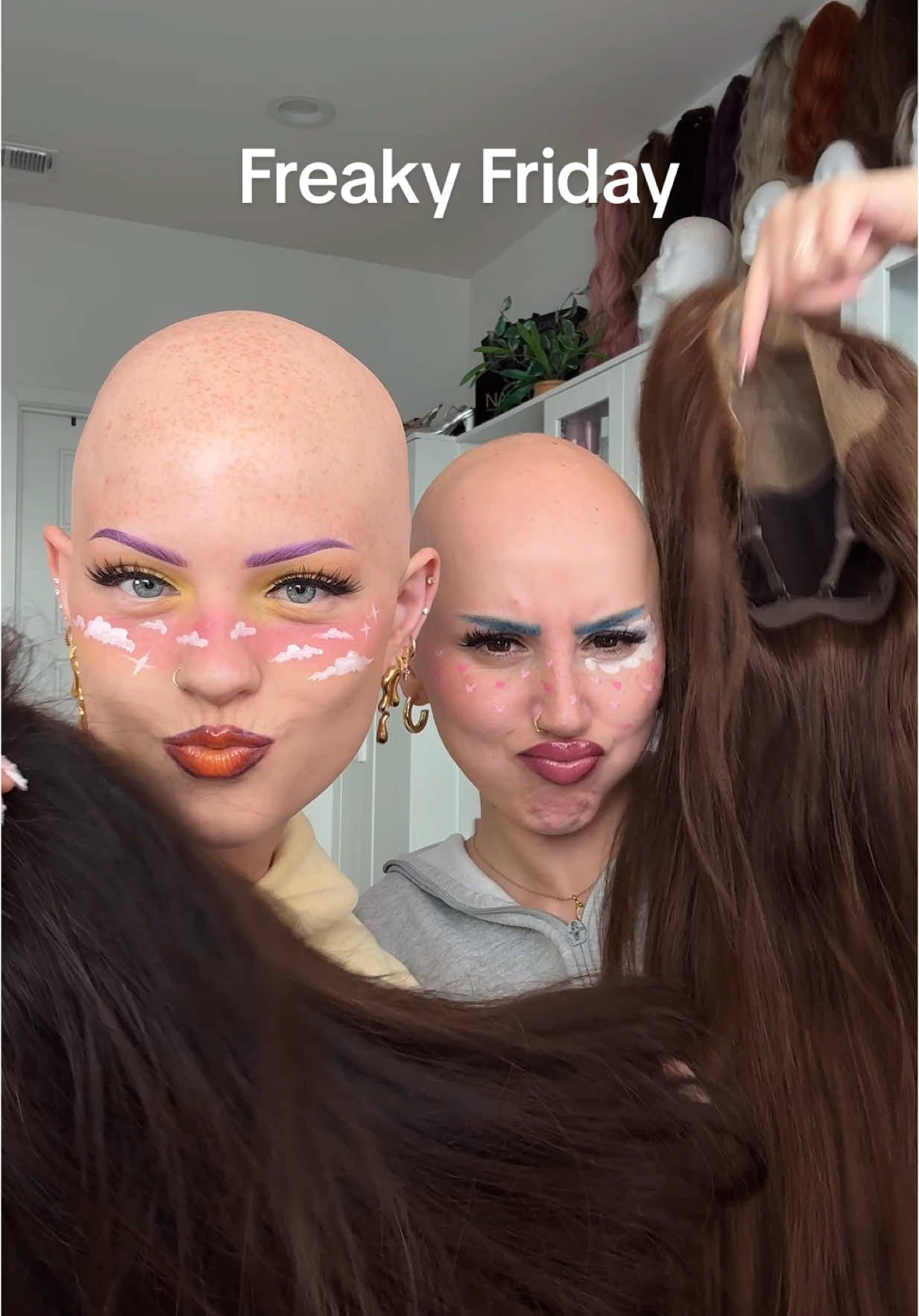 A post by @ on TikTok caption: It’s FRIDAY and we definitely look FREAKY… Clouds 2 weeks in a row?? HOW DO YOU GUYS LIKKE THE TURN OUT? Emmy’s wig is from @M O R A M O D E  Alex’s wig is from @Jadora Secret 