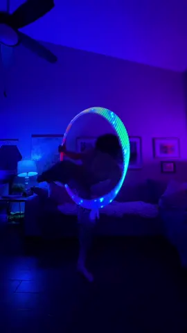 A post by @queerbassqueen on TikTok caption: Some LED hoop flow to my favorite song rn 🕺🏻 I’m almost 7 months into my hooping journey eeep #hoopflow #hooper #flowarts  #ledhoop 