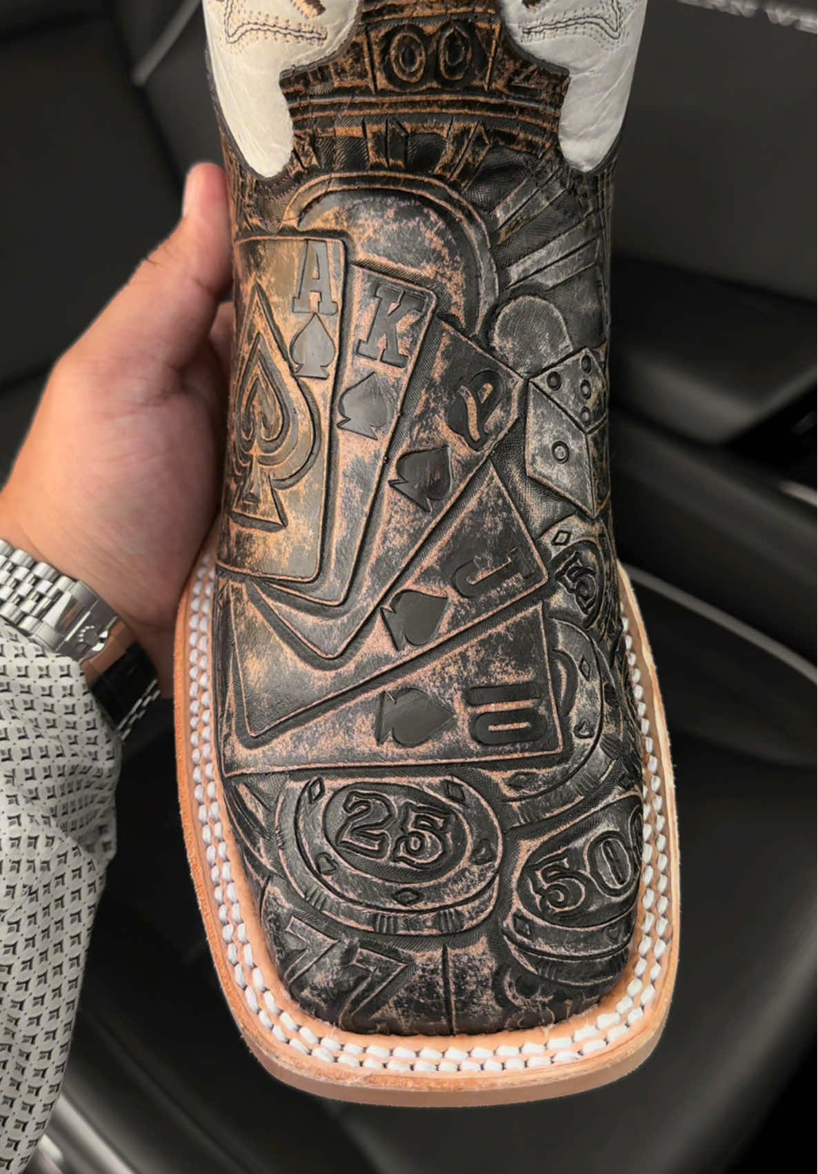 A post by @alfawesternwear on TikTok caption: These Are Straight 🔥🔥🔥 ⚒️🎰♠️🍀 #alfawesternwear #alfawesternwearboots #texas #cowboyboots #westernwear #cowboyshit #botasvaqueras #handtooled 