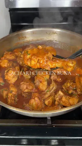 A post by @sharmineats on TikTok caption: Achari Chicken Buna 🥘 ‼️(PSA: There is a fake account “sharmineats06” going around asking people for money and other things! Please report that account and block them.‼️ 2-4 tbh Ghee  2 tbsp ginger/garlic paste  1 large onion  2 tsp salt  5-7 green chilies  1 tomato  1 tbsp tomato paste  1 cup water  2 tbsp curry powder  1 tsp turmeric  2 tbsp red chili powder  2 tsp cumin  2 tbsp Shan mango achar  1 large chicken (chopped) Cilantro  #fypppp #acharichicken #bangladeshifood #benaglifood #chickencurry #spicychicken #sharmineats 