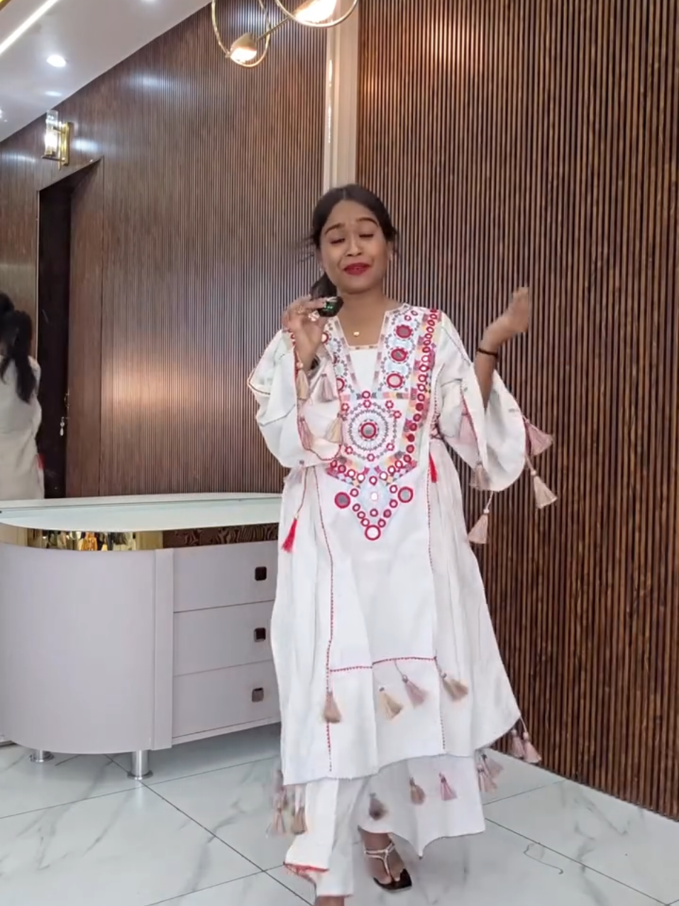 A post by @uksuits__collections1 on TikTok caption: +447404679080 order on WhatsApp #outfit #longdress #anarkali #pakistanifashion #weddingsuit 