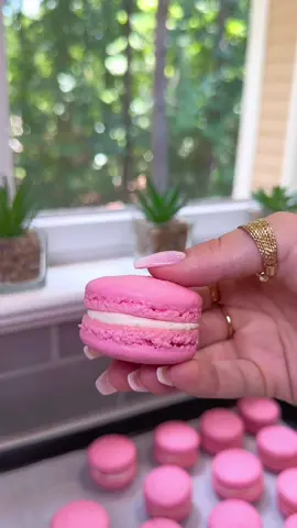 A post by @liviabenson on TikTok caption: strawberry milk macarons 🍓🍰 #macarontutorial #macarons