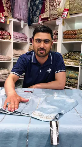 A post by @fabeha_sarees on TikTok caption: FBSR-652 Designer Saree with Delicate Golden Detailing Drape yourself in understated elegance with this rich look designer saree, featuring delicate golden thread detailing and a subtly shimmering fabric finish. The minimalistic striped embroidery gives it a graceful flow, while the intricately bordered pallu and hem add a touch of finesse. Perfectly paired with a matching stitched blouse, this saree is your go-to for graceful festivities and sophisticated gatherings. #partywearsaree #tiktokmademebuyit #fyp #fabehafashions #foryou 