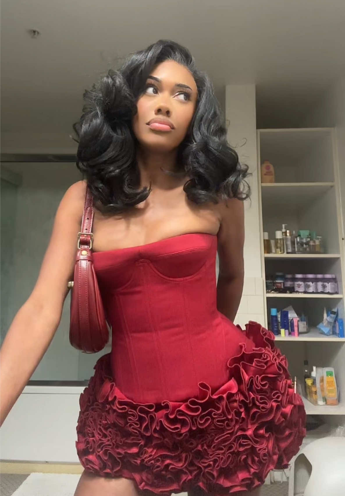 A post by @sydwinnie on TikTok caption: CAN WE GIVE A MOMENT TO THE DRESS . . . . . . #birthday #birthdaygirl #reddress #birthdaydress