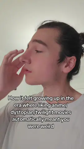 A post by @mayzeson on TikTok caption: my 2000/10 babies know #fyp #twillight #hungergames #anime #weird 