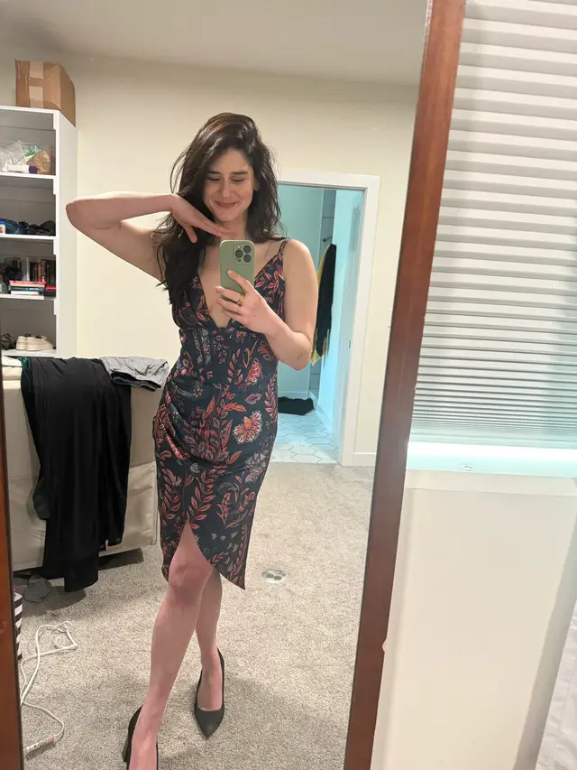 A post by @elysemyers on TikTok caption: #fancywednesday August 20th, I want you to get together with your friends (yes, on a Wednesday night) and wear an outfit you love but haven’t had an occasion to wear it to. This is a dress and a ring I bought because I lovedddddd them but haven’t had anywhere to wear them. SO! For my 32nd birthday this year I’m creating a fancy-ish dinner with a few of my favorite people so I can wear this dress in Vegas. 😂🙌🏼 I think we should all do this collectively. Agreed? Agreed. See ya in your cool outfits on August 20th. I’m honestly so excited about this, I hope you actually do it with me! (I couldn’t resist flipping the camera off to show my snake ring because it just felt so right while wearing it on my middle finger.)