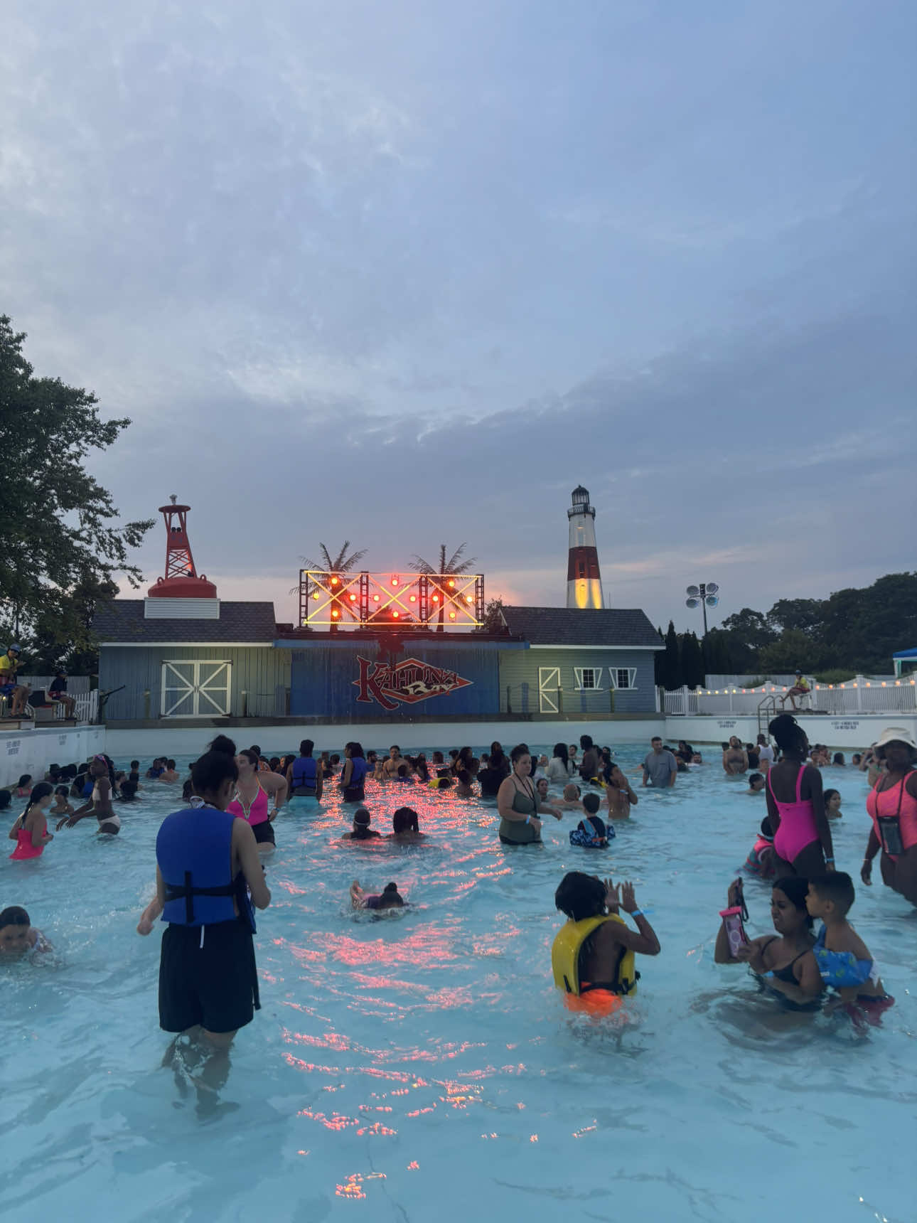 A post by @prettyluhtiinnaa on TikTok caption: Splish Splash - Neon Nights 10/10 😛 @splishsplashwp  ONLY Friday & Saturday July 11 - August 17 from 7PM-10PM ‼️ Attractions included: Bootlegger’s Run Bombs Away Riptide Racer, Dr. Von Dark’s Tunnel of Terror Kahuna Bay Wavepool  #splishsplash #waterpark #neonnights #explorepage #exploremore #explore #longisland #thingstodoinny #splishsplashny #sᴜᴍᴍᴇʀ2025 #contentcreator