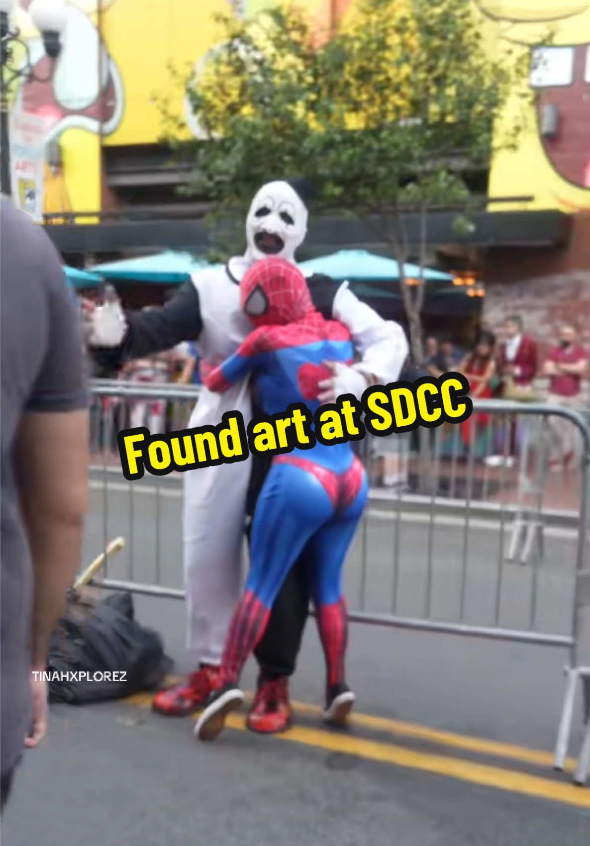 A post by @tinaexplorez on TikTok caption: Found Art at SDCC! #onthisday #sdcc #viral #cosplay #sdcc #foryou #sandiego #spiderman 