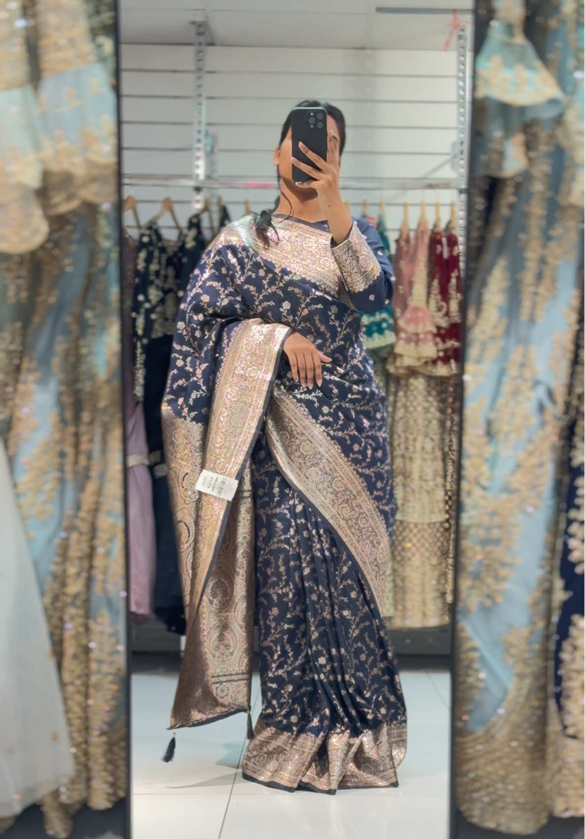 A post by @fabeha_sarees on TikTok caption: Elegant Banarasi Silk Saree with Antique Zari Weaving Make a bold and beautiful statement with this *Elegant Banarasi Silk Sarees*, a timeless treasure for every wardrobe. Crafted from luxurious Banarasi silk, this saree features intricate antique gold zari work in traditional floral and paisley patterns that exude regal charm. The contrast of rich fabric with ornate weaving makes it a perfect pick for festive events, weddings, and evening occasions.  #tiktokmademebuyit #partywearsaree #weddingsaree #saree #sareelover 