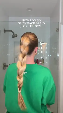 A post by @graciekramer8 on TikTok caption: Trying the slick back braid for my workout today💅🏽 What do we think?✨ #hair #tutorial #hairtips #slickback #hairstyle #gym 