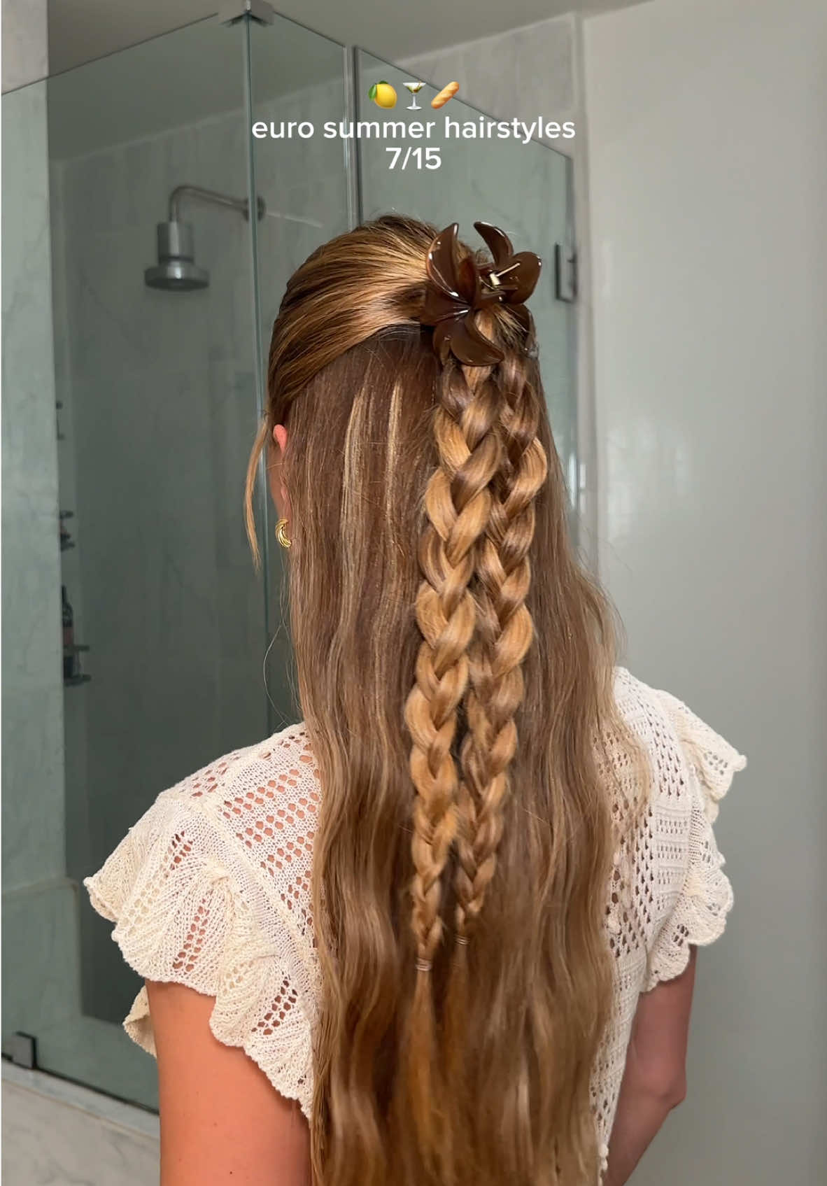 A post by @anggwells on TikTok caption: easy summer hairstyle 🌺
