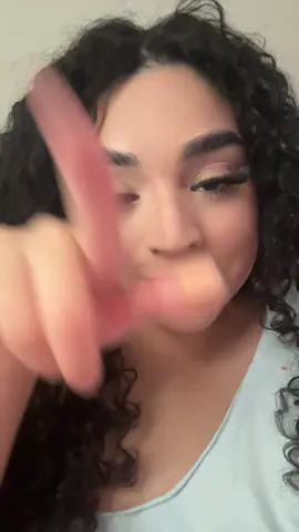 A post by @ on TikTok caption: ignore the stain on my shirt 😩 #fypシ #curlygirly #lashclusters 
