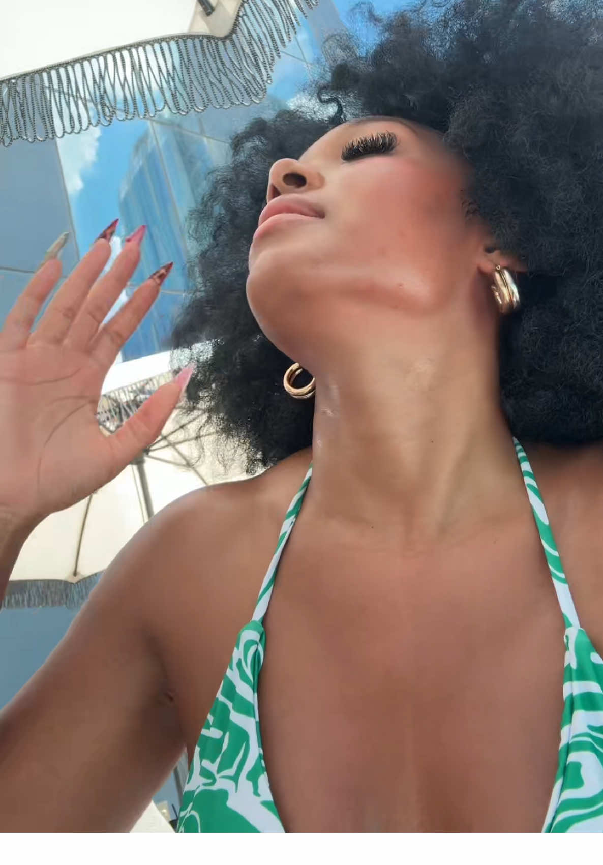 A post by @lelliessantiago on TikTok caption: Tanning Olympics is whooping my ass #pov #fyp #foryou #fy #tanning 