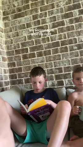 A post by @itsthemodernmom on TikTok caption: One is obsessed with reading…. The other keeps us on our toes. #fyp #foryou 