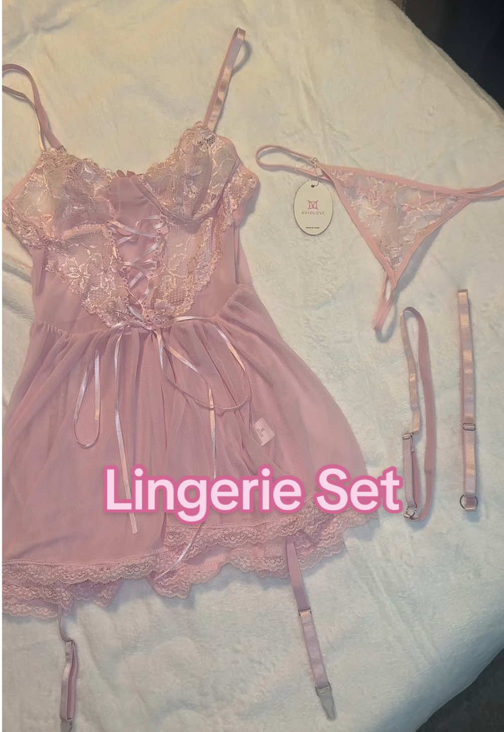 A post by @kickinitwith_kt on TikTok caption: Gorgeous lingerie set! 🩷 Pink lace is my favorite.  #lingerie #pink #lace #hotmom #MomsofTikTok #baddie #fyp 