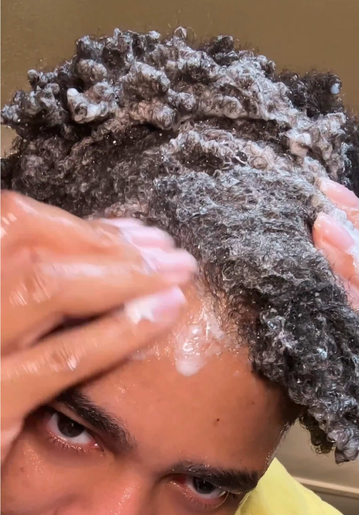 A post by @scotfknlouie on TikTok caption: Wash Day Routine Using @PATTERN Beauty @THE OUAI @CÉCRED 