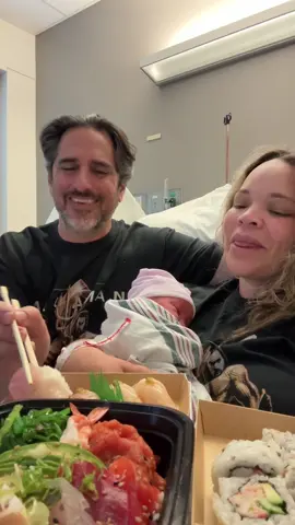 A post by @trishlikefish88 on TikTok caption: Post c-section sushi mukbang 🍣 