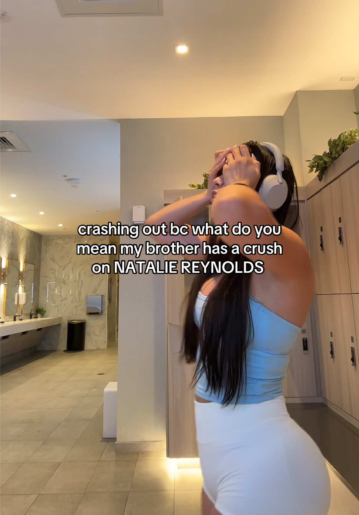 A post by @aishah on TikTok caption: crashing out in the gym locker room