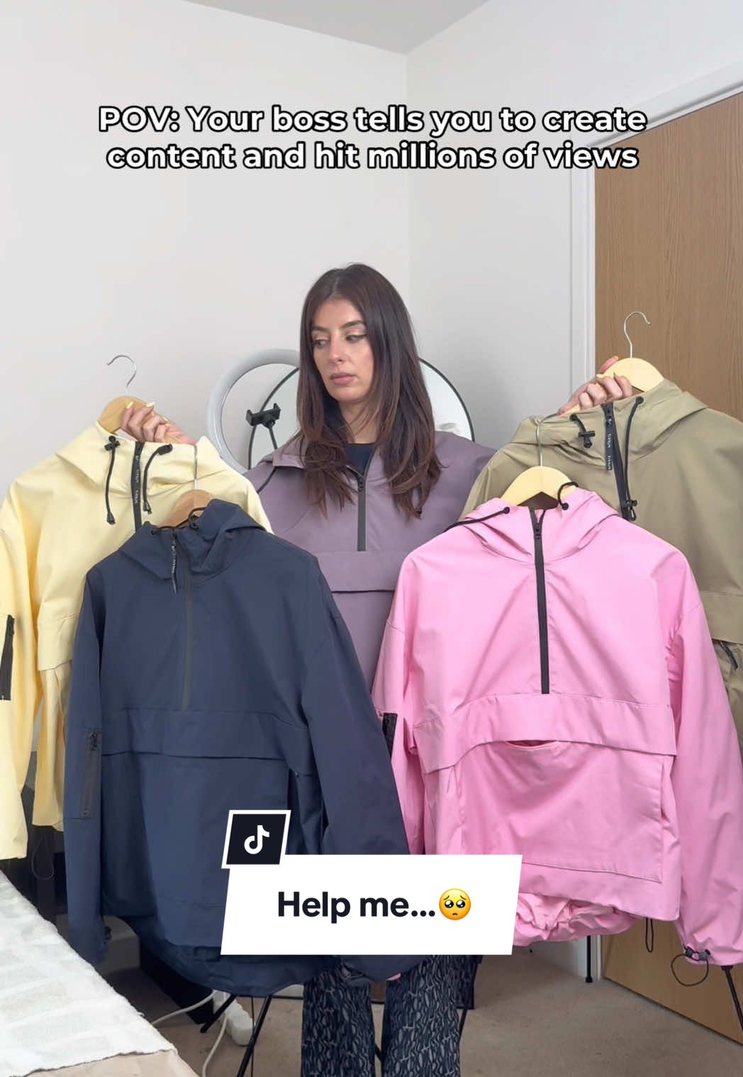 A post by @puffit.uk on TikTok caption: And this song just stuck in my head for the whole day…🤯 #puffit #socialmedia #marketinghumor #officehumor #raincoat #fyp #waterproofjacket 