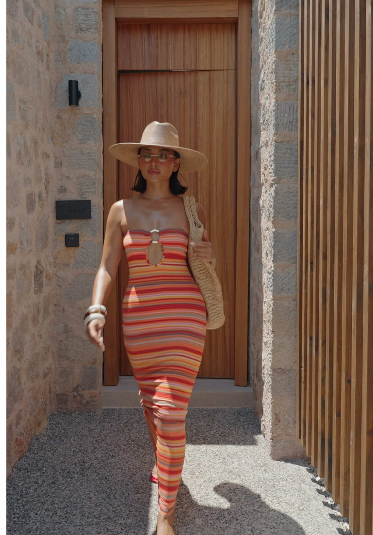 A post by @ on TikTok caption: My Holiday looks from KOS 🥥🐚🏖️