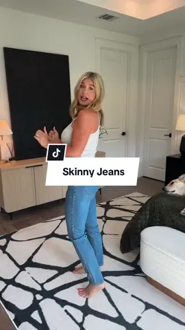 A post by @shelbstales on TikTok caption: bringing back the skinny jeans (for myself) y’all can wear whatever you want. Can’t wait for skinny jeans with tall boots & chunky cardigans this fall #fall2025 #fallfashion #fallfashiontrends #skinnyjeans #tallboots #chunkycardigans #2000sthrowback 